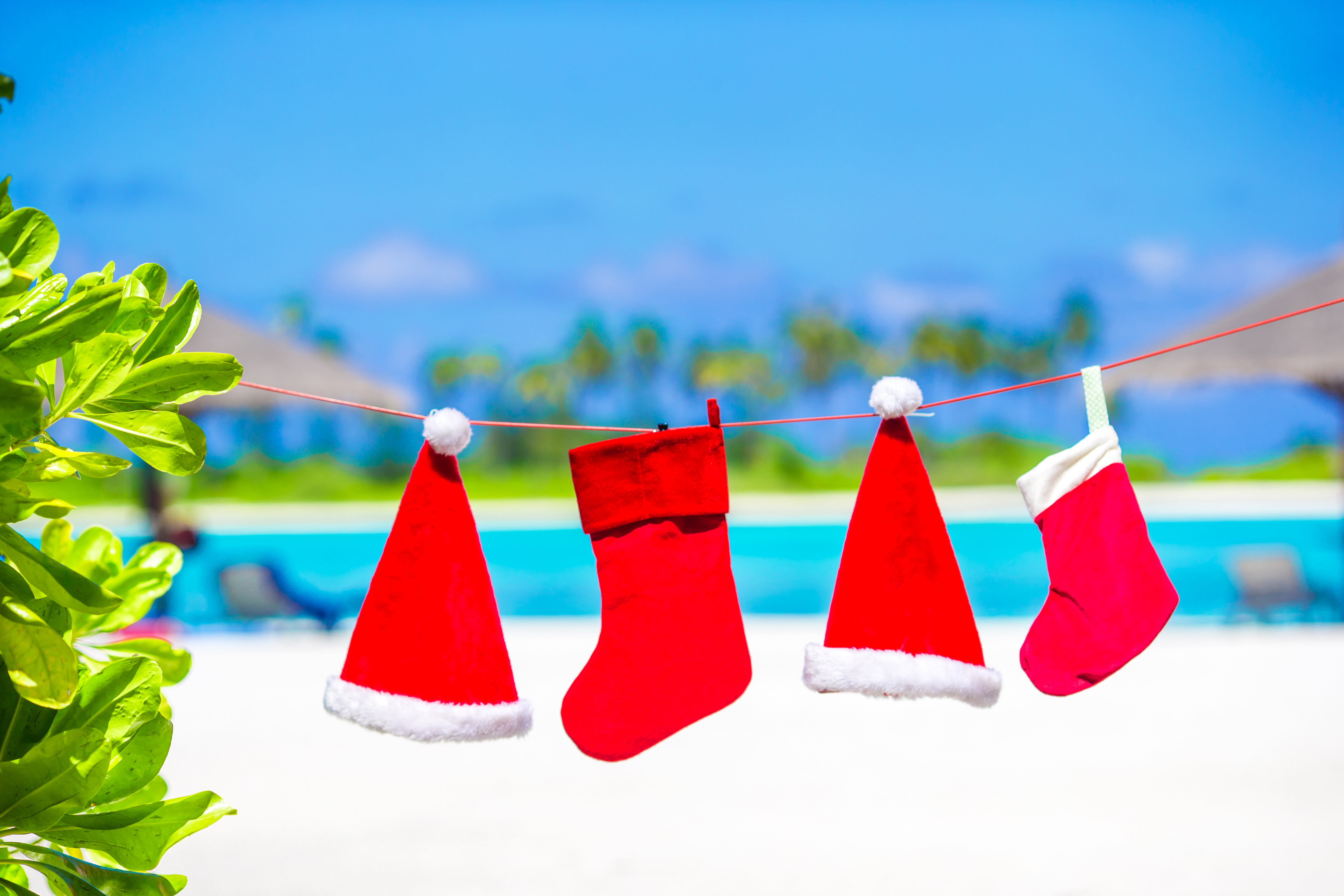 christmas-concept-santa-hats-and-stocking-backgro-2025-02-11-15-54-16-utc