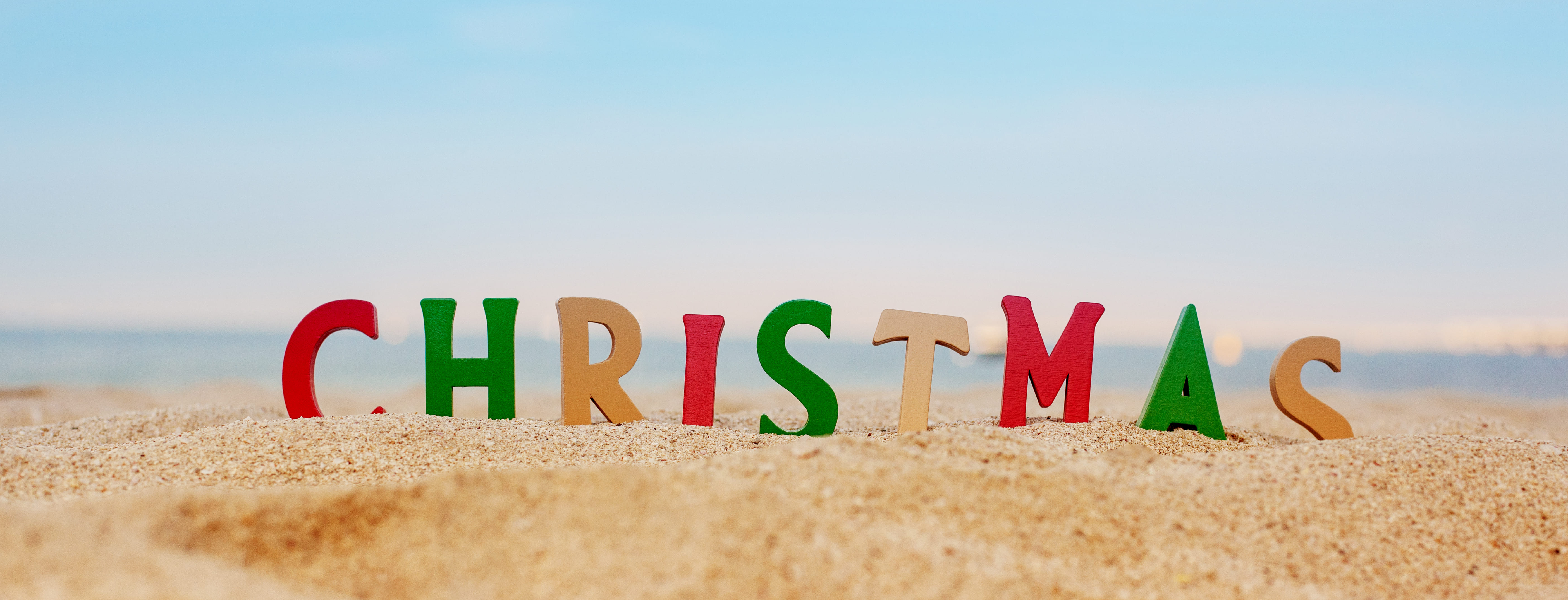 christmas-lettering-in-colored-letters-on-the-beac-2024-09-17-08-38-40-utc_1